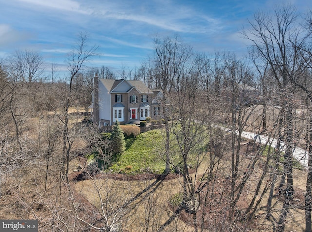 view of front of house with a chimney