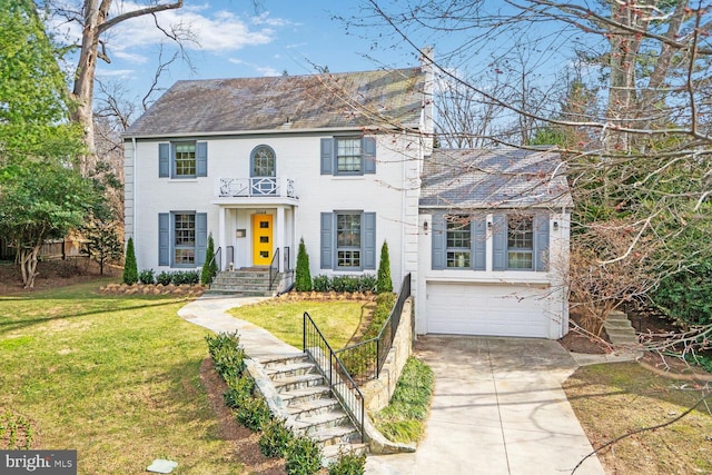 view of front of home featuring a garage, a front yard, driveway, and fence