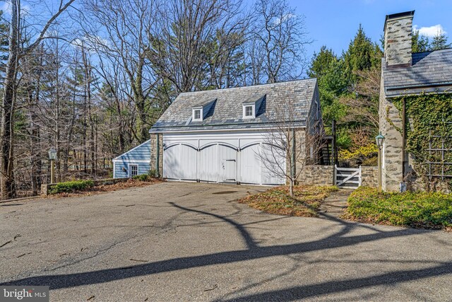 detached garage with fence