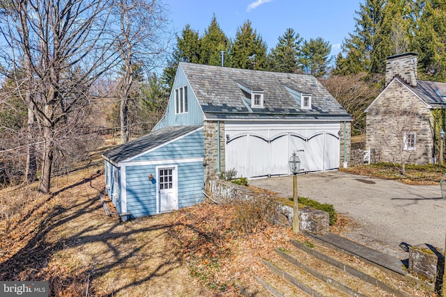 exterior space with a garage