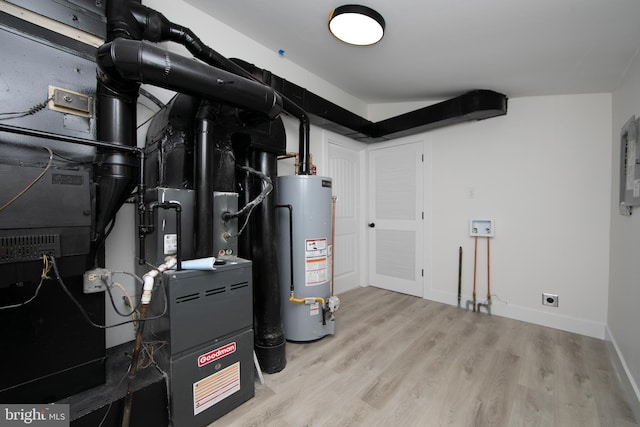 utility room featuring gas water heater