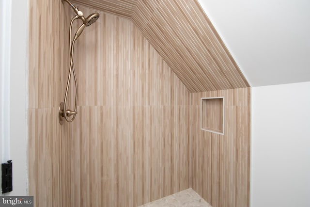 interior space featuring tiled shower