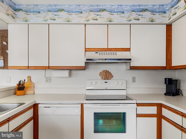 kitchen featuring white cabinets, white appliances, ventilation hood, and light countertops