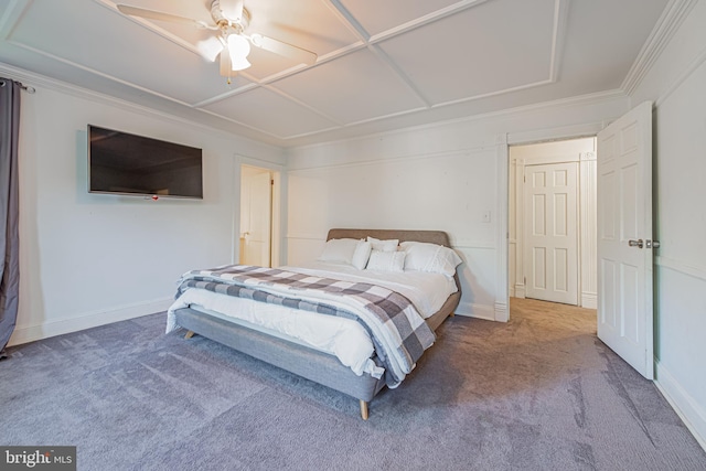 bedroom with ceiling fan, baseboards, and carpet flooring