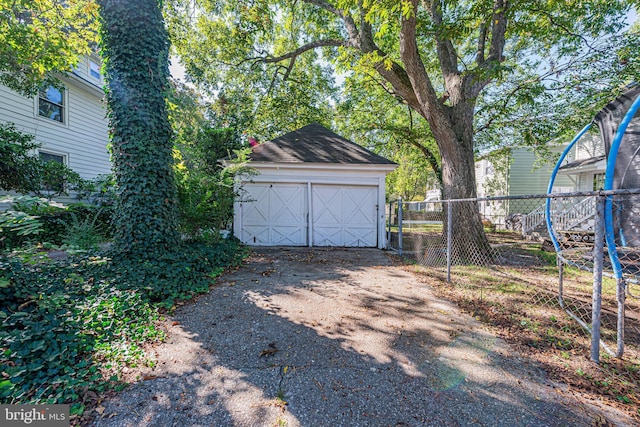 detached garage with fence