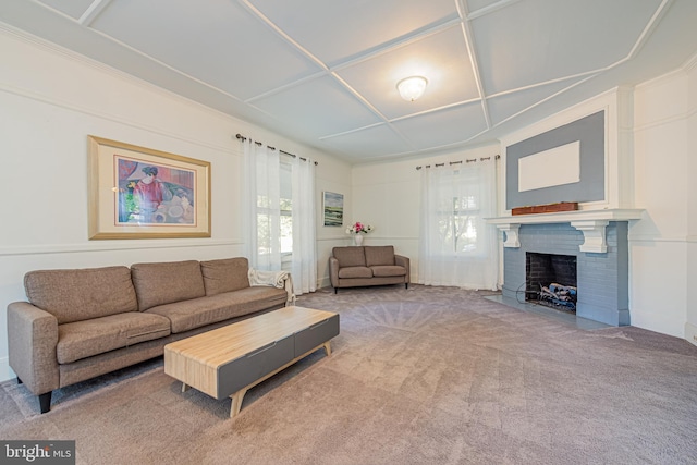 carpeted living room with a fireplace and a wealth of natural light