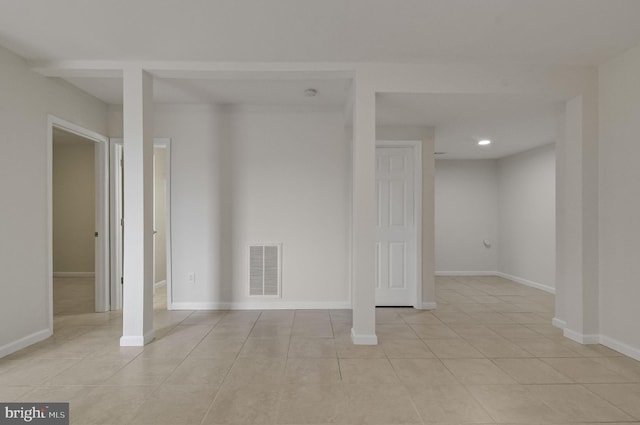 empty room featuring recessed lighting, visible vents, baseboards, and light tile patterned flooring