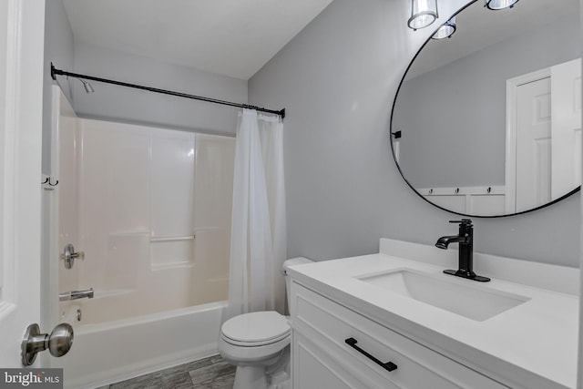 bathroom with toilet, shower / bath combination with curtain, and vanity