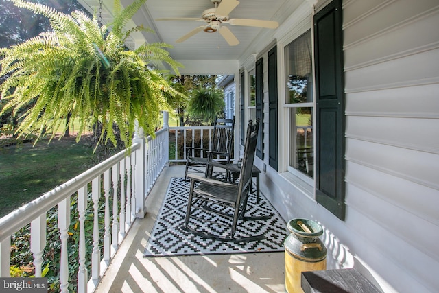 balcony with a sunroom and a ceiling fan