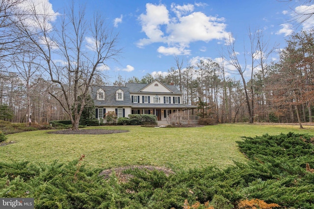 view of front of home featuring a porch and a front lawn