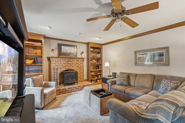 carpeted living area featuring a wood stove, a ceiling fan, and crown molding