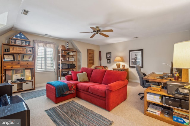 living area with carpet floors, baseboards, and visible vents