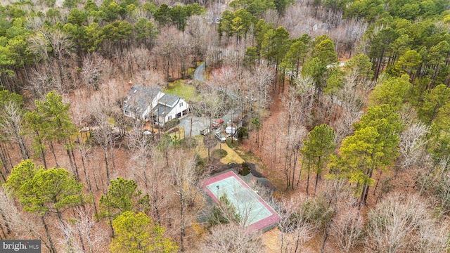 bird's eye view featuring a forest view