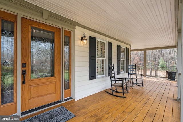 property entrance with a porch