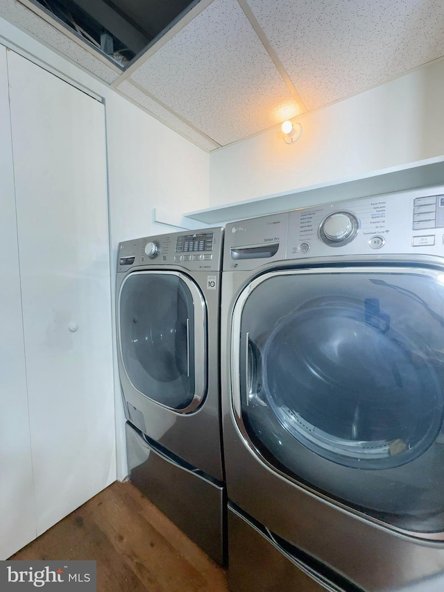 laundry room with laundry area and separate washer and dryer