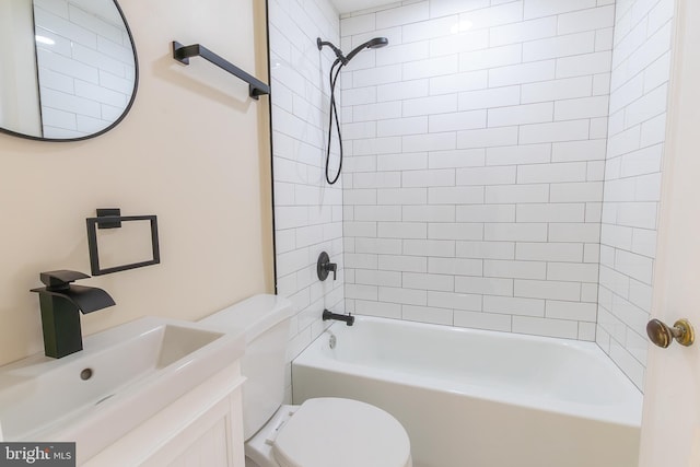 bathroom featuring toilet, shower / tub combination, and vanity