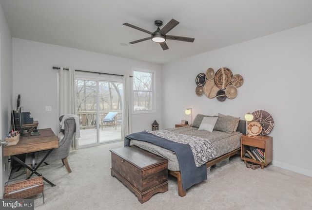 bedroom featuring light carpet, access to outside, a ceiling fan, and baseboards