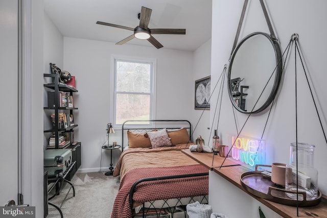 carpeted bedroom with baseboards