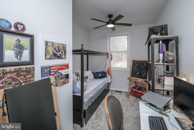 bedroom with carpet, ceiling fan, and baseboards