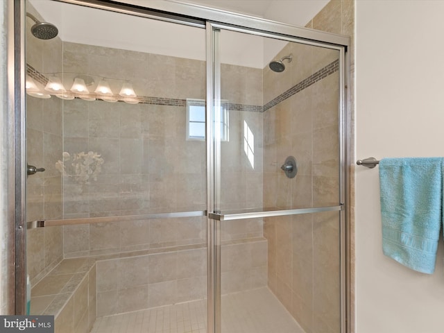 bathroom featuring a shower stall