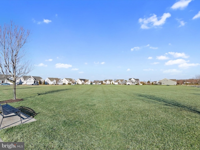 view of yard featuring a residential view