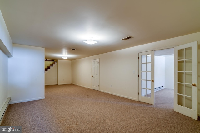 spare room featuring carpet flooring, french doors, stairs, and visible vents