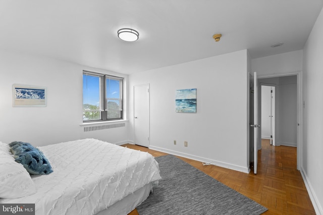 2601 Pennsylvania Ave Unit 952, Philadelphia, PA 19130 - bedroom featuring radiator heating unit and baseboards
