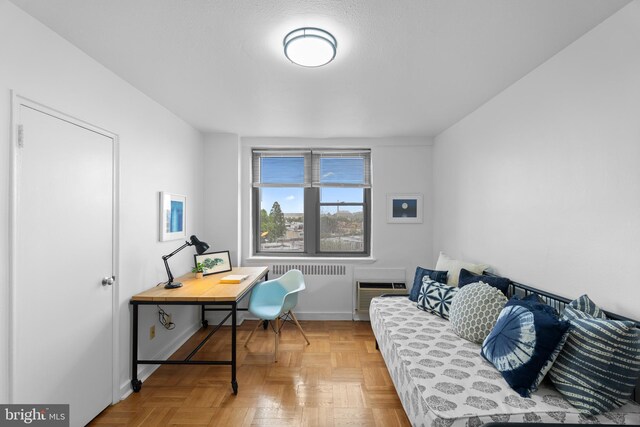 2601 Pennsylvania Ave Unit 952, Philadelphia, PA 19130 - office space featuring baseboards, radiator heating unit, and an AC wall unit