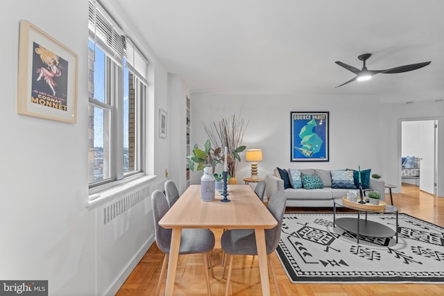 2601 Pennsylvania Ave Unit 952, Philadelphia, PA 19130 - dining room featuring ceiling fan, radiator heating unit, and baseboards