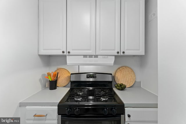 2601 Pennsylvania Ave Unit 952, Philadelphia, PA 19130 - kitchen featuring under cabinet range hood, black gas range, white cabinetry, and light countertops