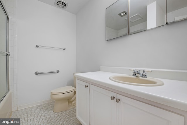 bathroom with visible vents, bath / shower combo with glass door, toilet, tile patterned floors, and vanity