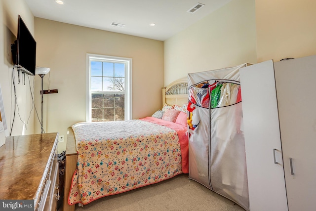 bedroom featuring visible vents, carpet flooring, and recessed lighting