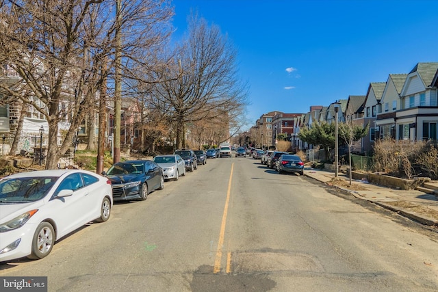 view of road with a residential view