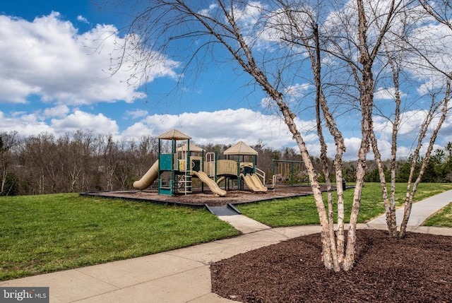 community play area featuring a lawn