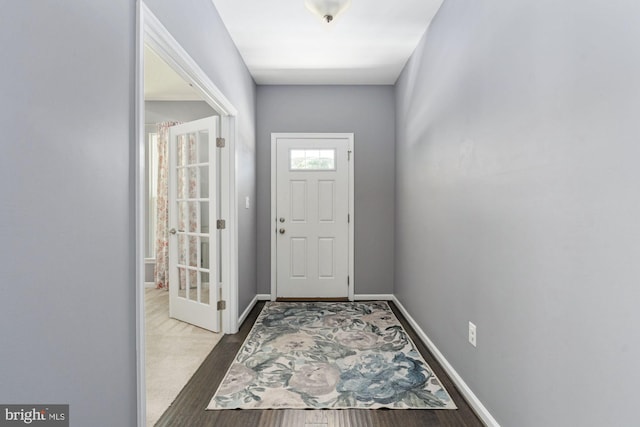 doorway with baseboards