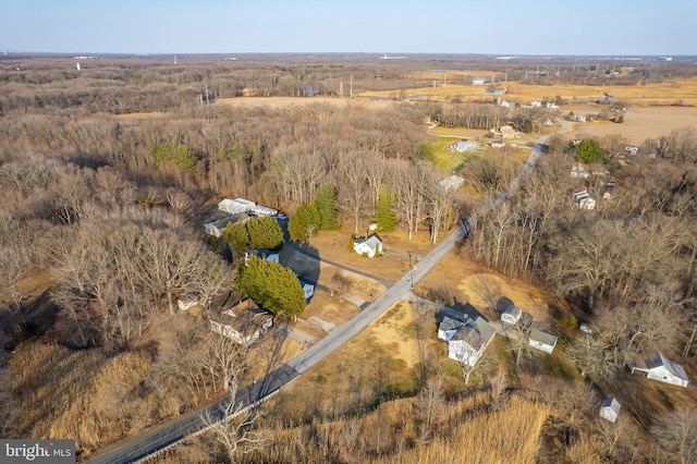 birds eye view of property featuring a rural view