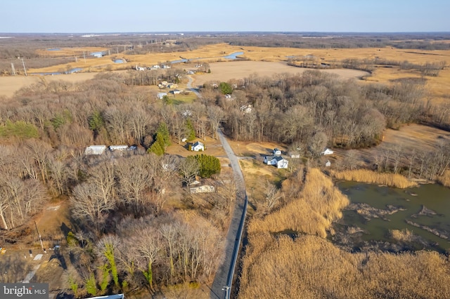 birds eye view of property with a rural view