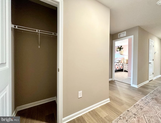 closet featuring visible vents