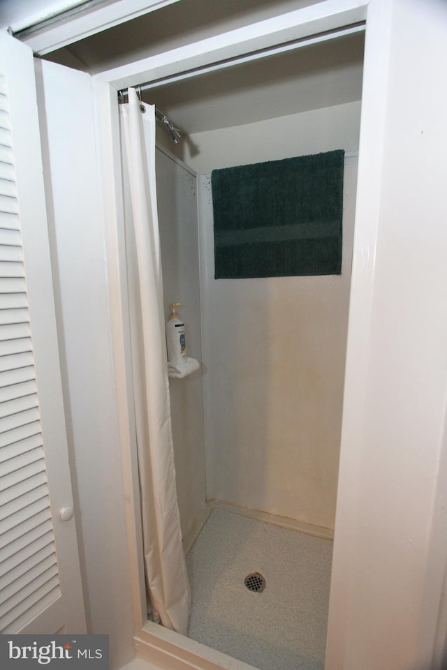 bathroom with a stall shower