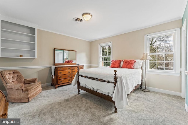 bedroom featuring visible vents, baseboards, carpet, and ornamental molding