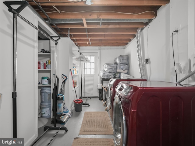 laundry room with washer and dryer and laundry area