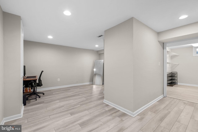 office with light wood-style flooring, recessed lighting, visible vents, and baseboards