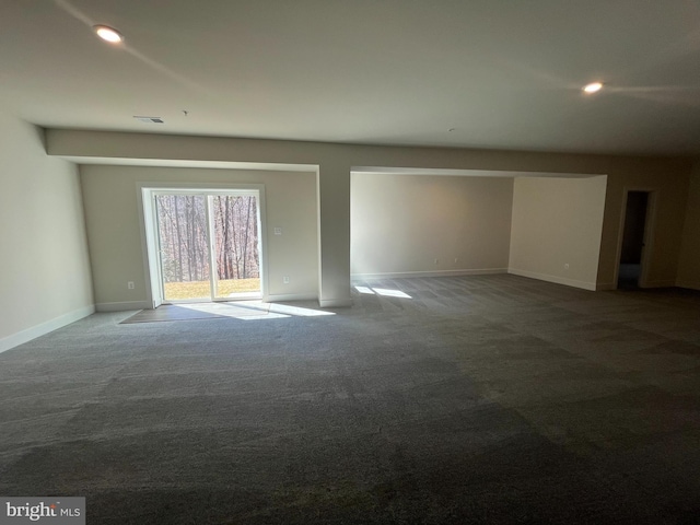 unfurnished room featuring recessed lighting, carpet flooring, visible vents, and baseboards