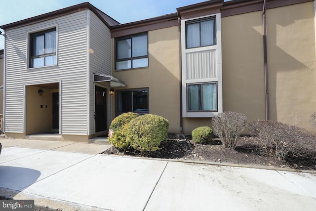 view of property featuring stucco siding