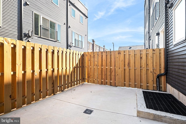 view of patio with fence