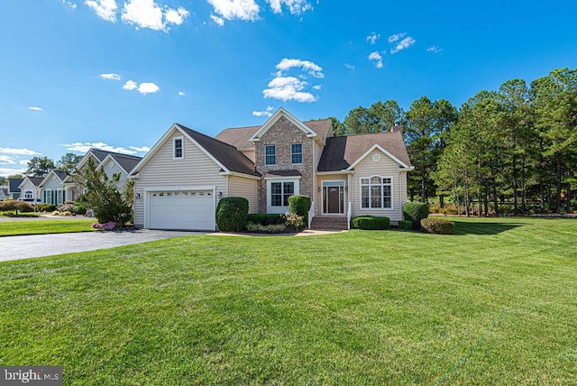 traditional-style home featuring a front yard, driveway, and a chimney