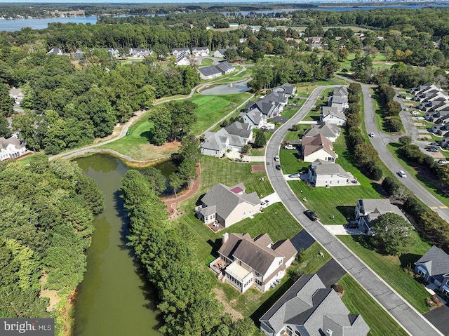 aerial view with a water view and a residential view