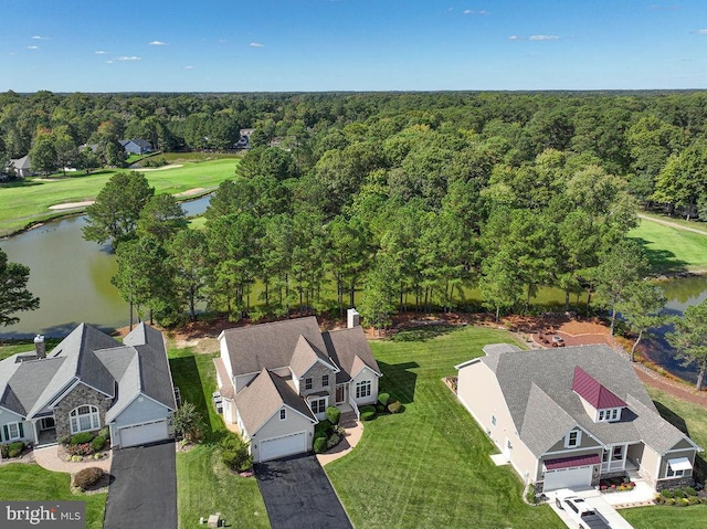 bird's eye view featuring a water view and a wooded view