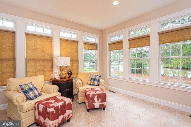 sunroom / solarium featuring visible vents