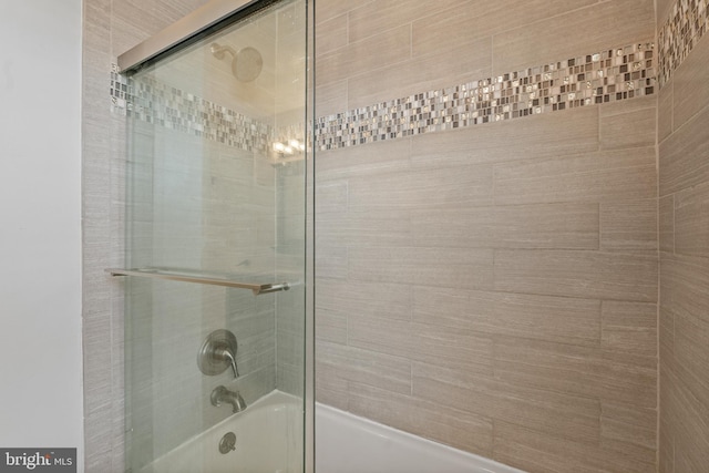 bathroom featuring enclosed tub / shower combo